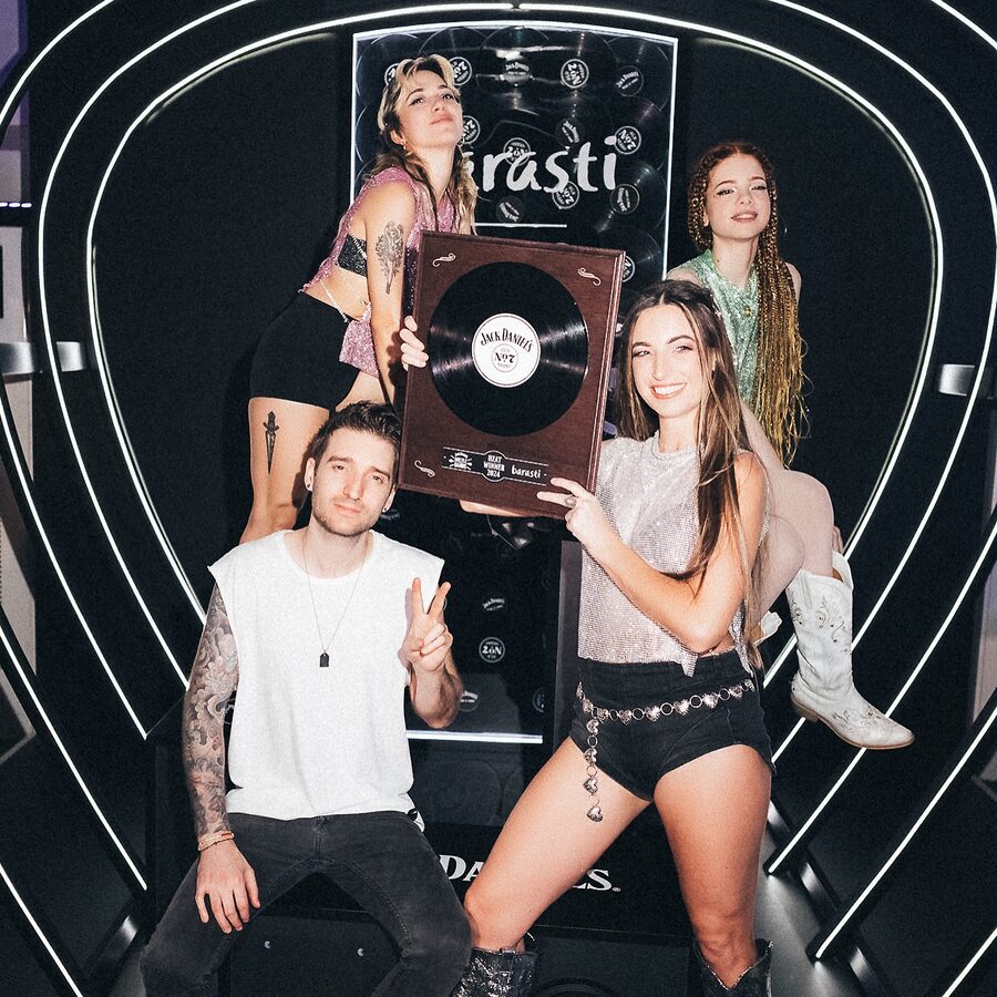 Ark Angels receiving a vinyl award on stage